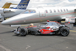 Learjet 60XR -vs- McLaren-Mercedes MP4/23